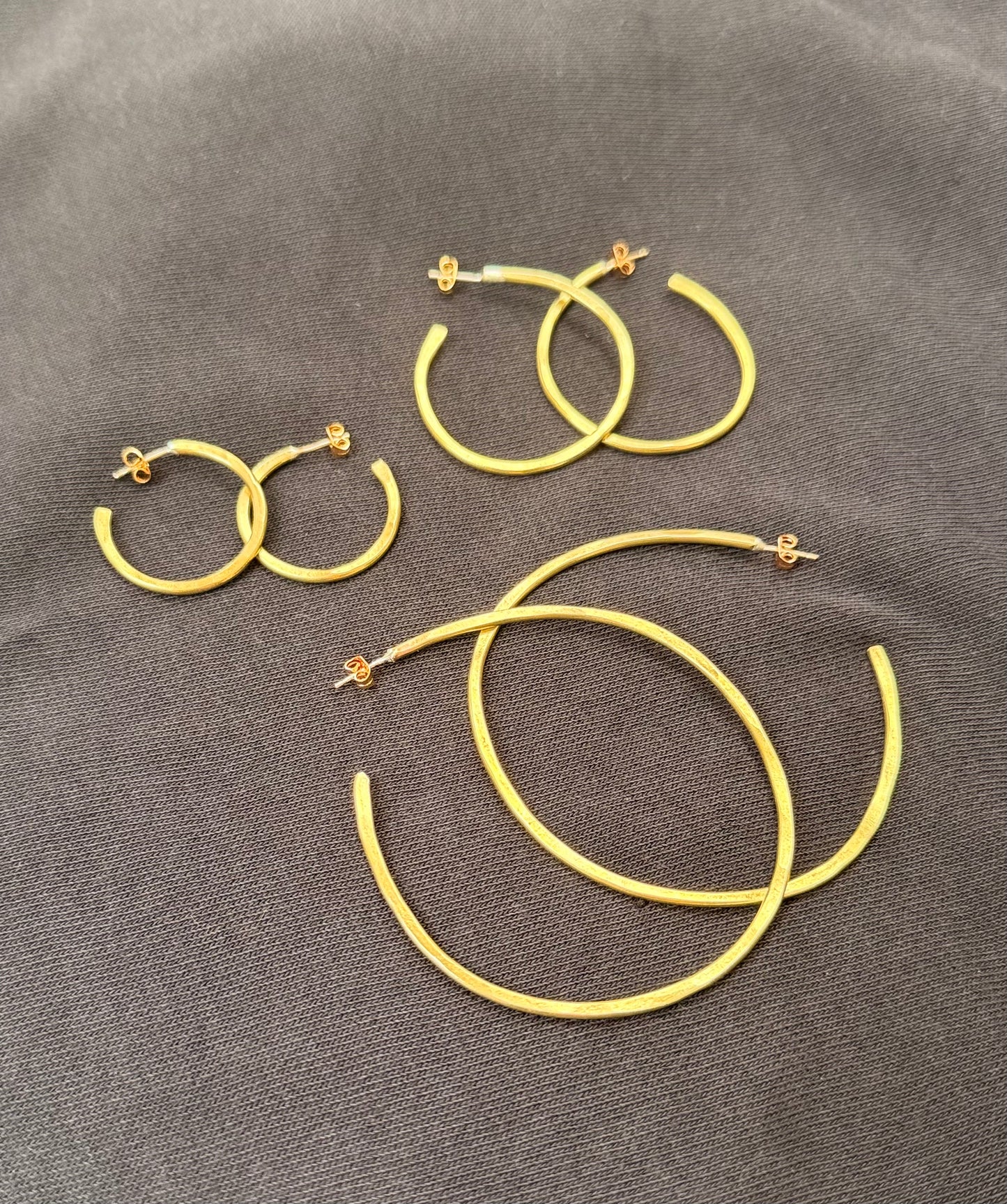 Large hammered brass hoop earrings