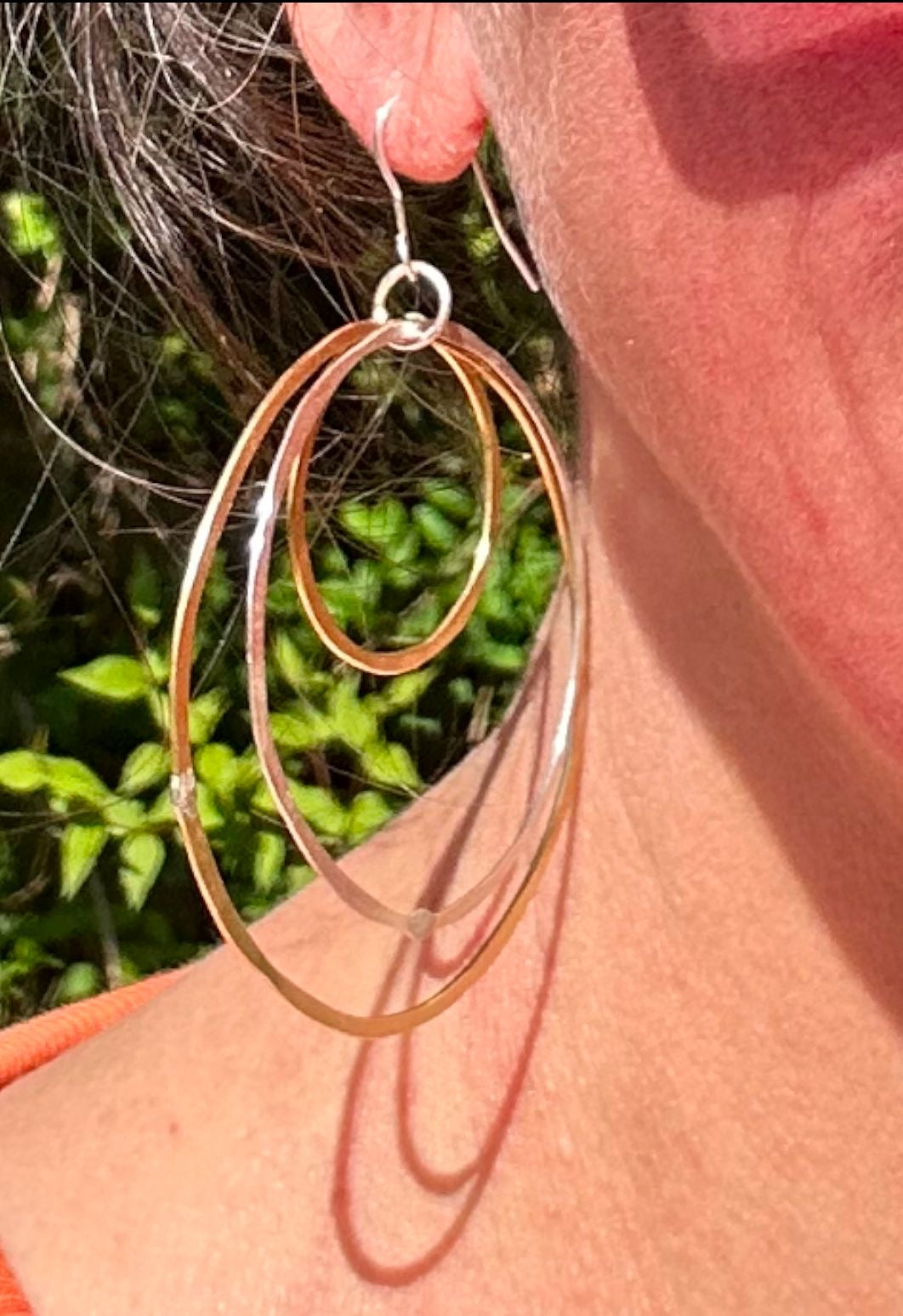 Large silver and brass tapered multi hoop earrings