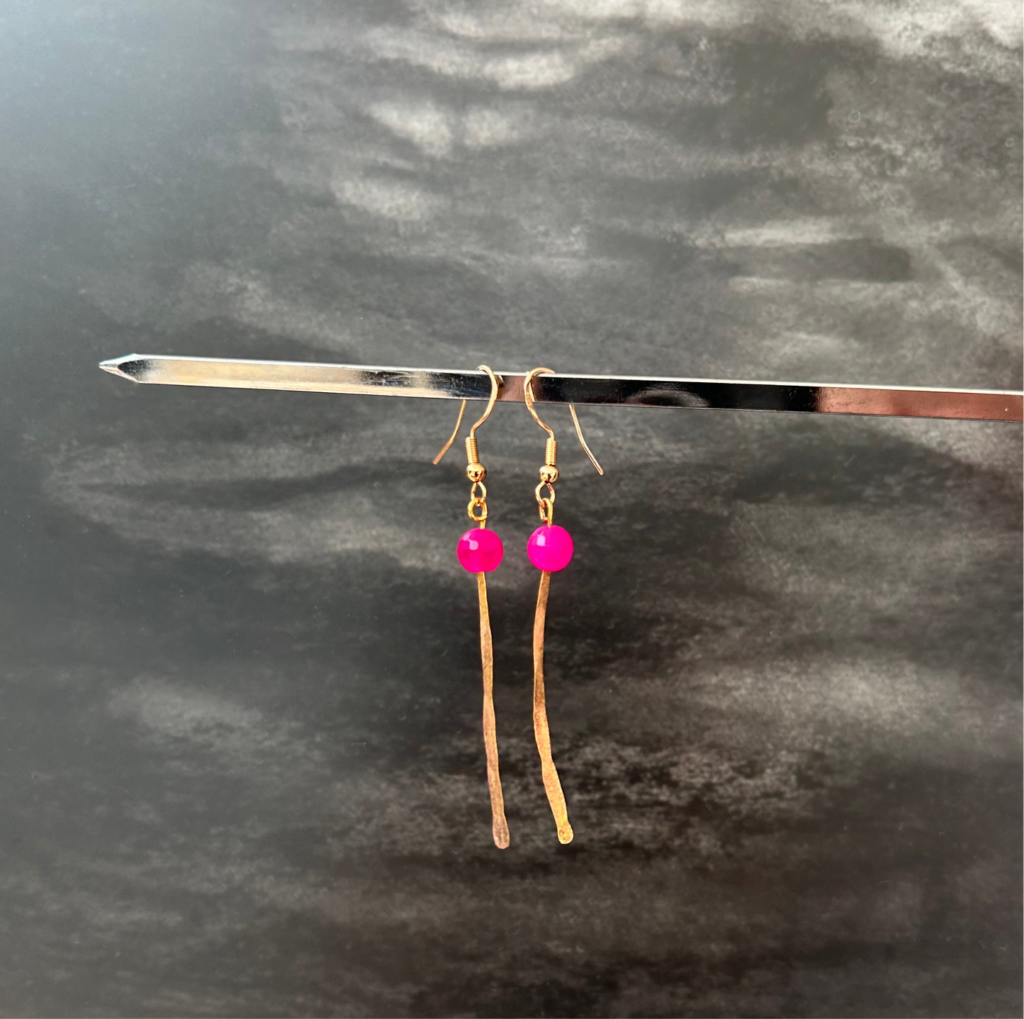 Gold plated and semi precious stones ribbon earring
