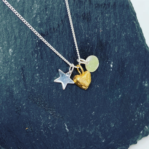 Gold plated heart, initial disc and star pendant