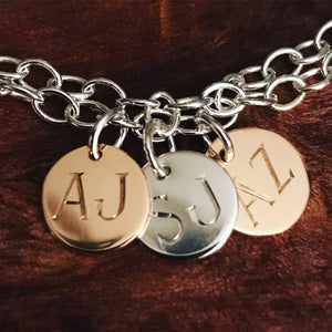 rose gold and silver triple initial disc bracelet