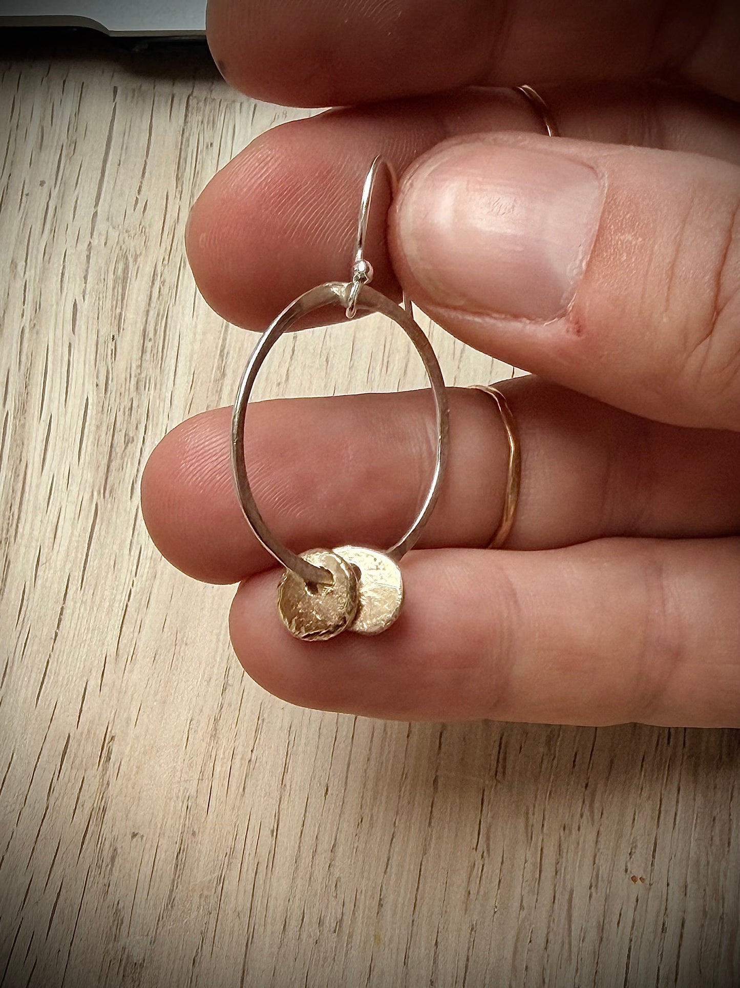silver hoop drop earrings with solid gold nugget charms