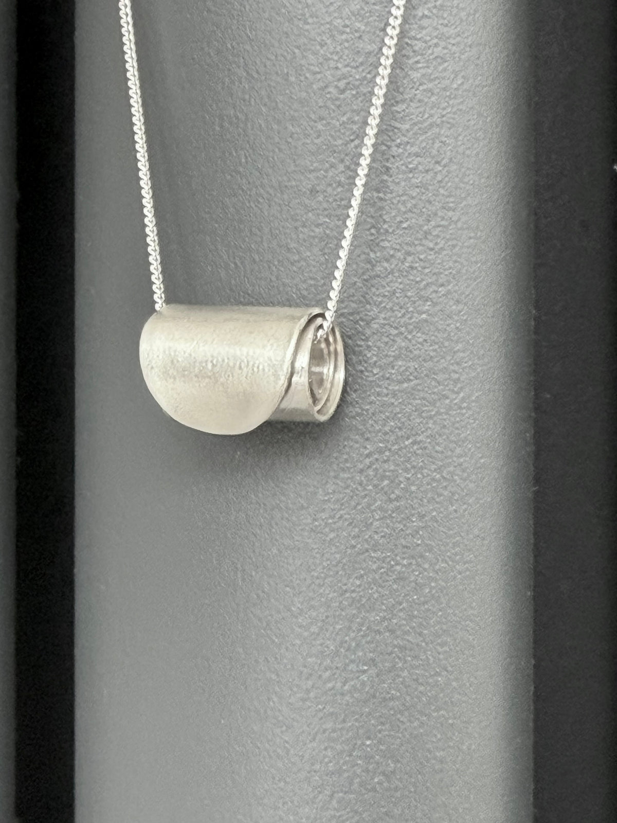Silver rolled pendant