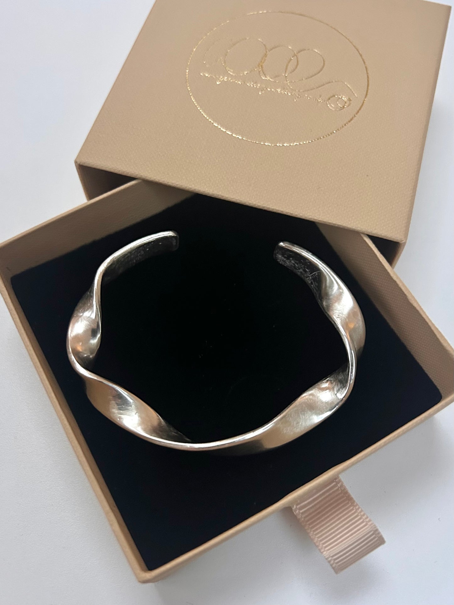 Solid silver twist cuff bangle