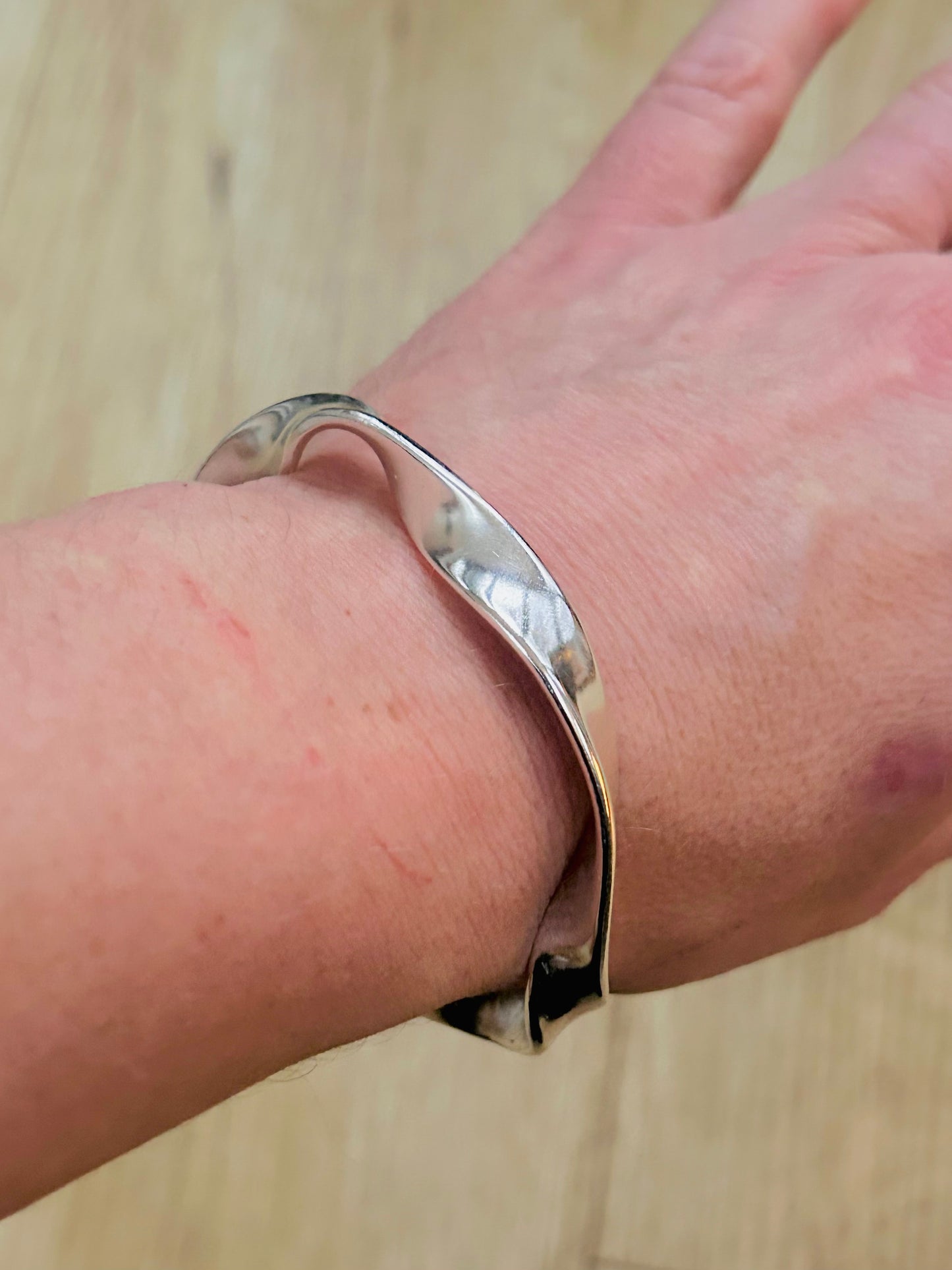Solid silver twist cuff bangle