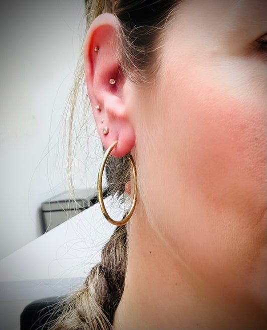 Medium hammered gold plated silver hoop earrings