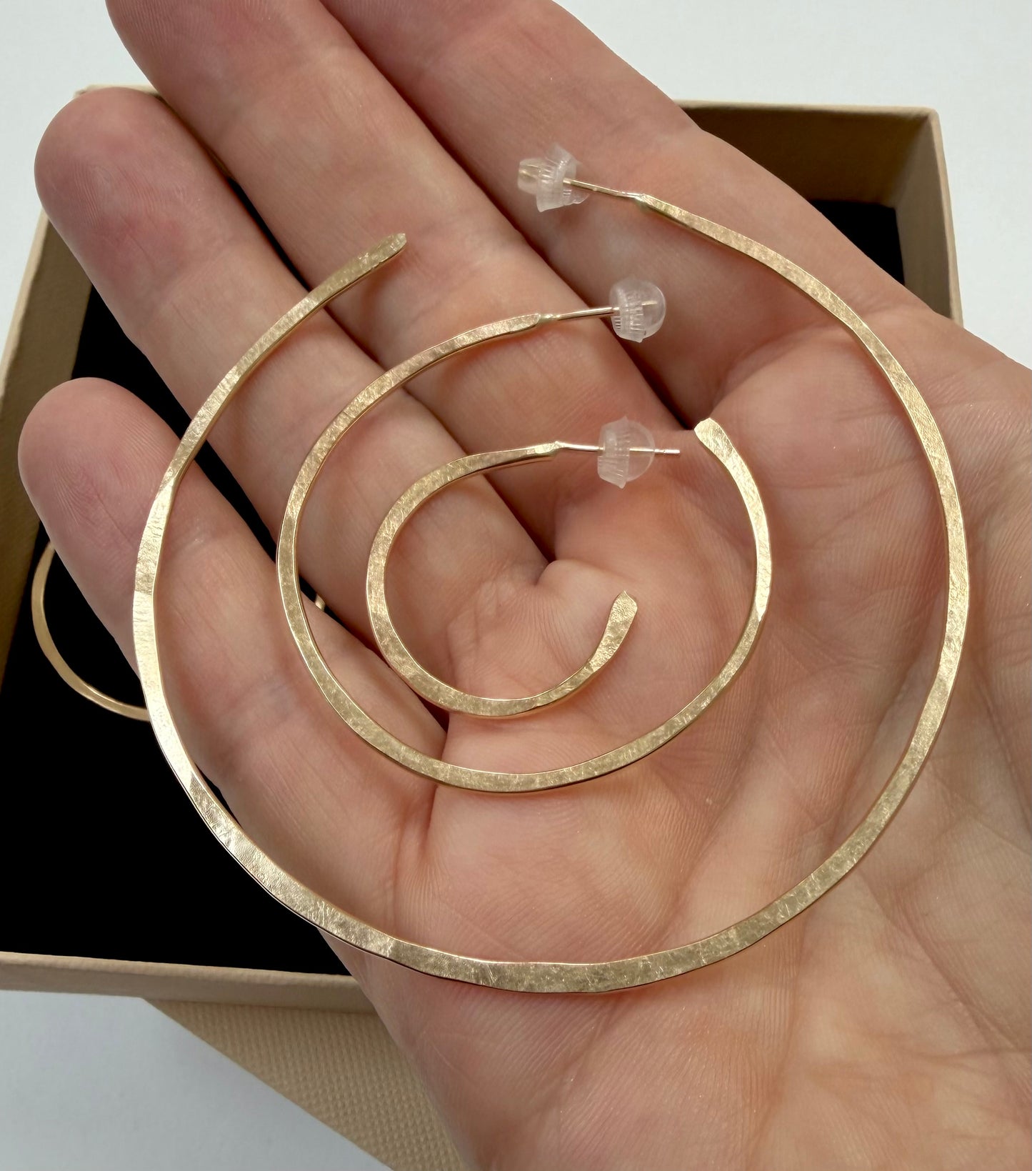 Medium hammered brass hoop earrings
