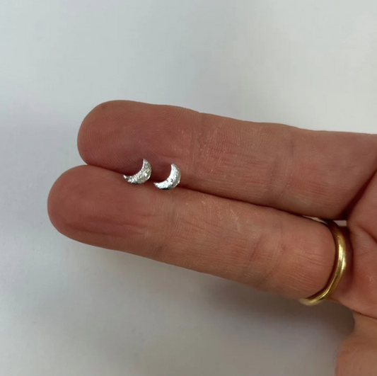 tiny silver crescent moon stud earrings