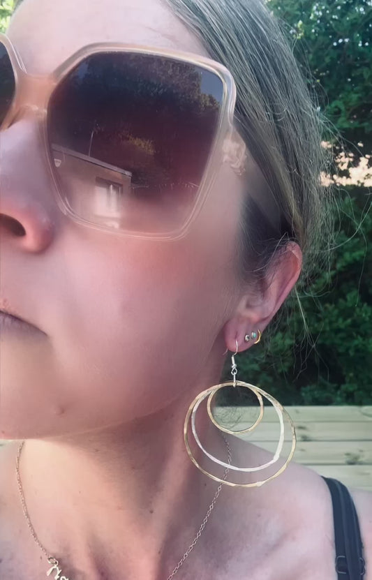 Large silver and brass tapered multi hoop earrings