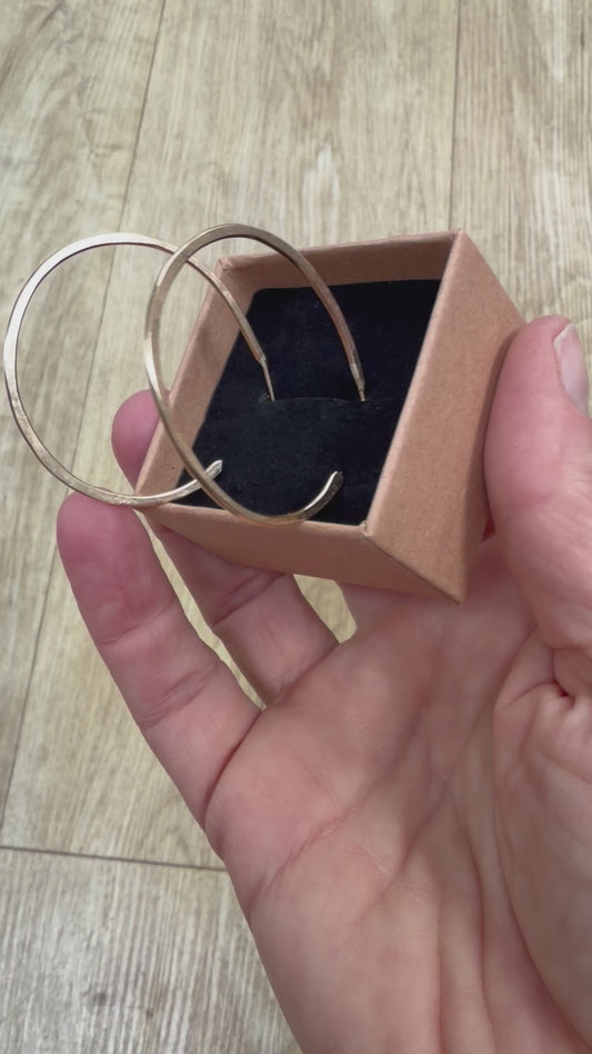 Medium hammered brass hoop earrings