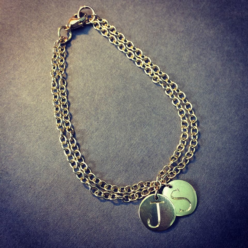 gold double chain and initial disc bracelet