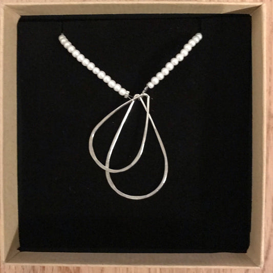 silver teardrop and pearl kinetic necklace