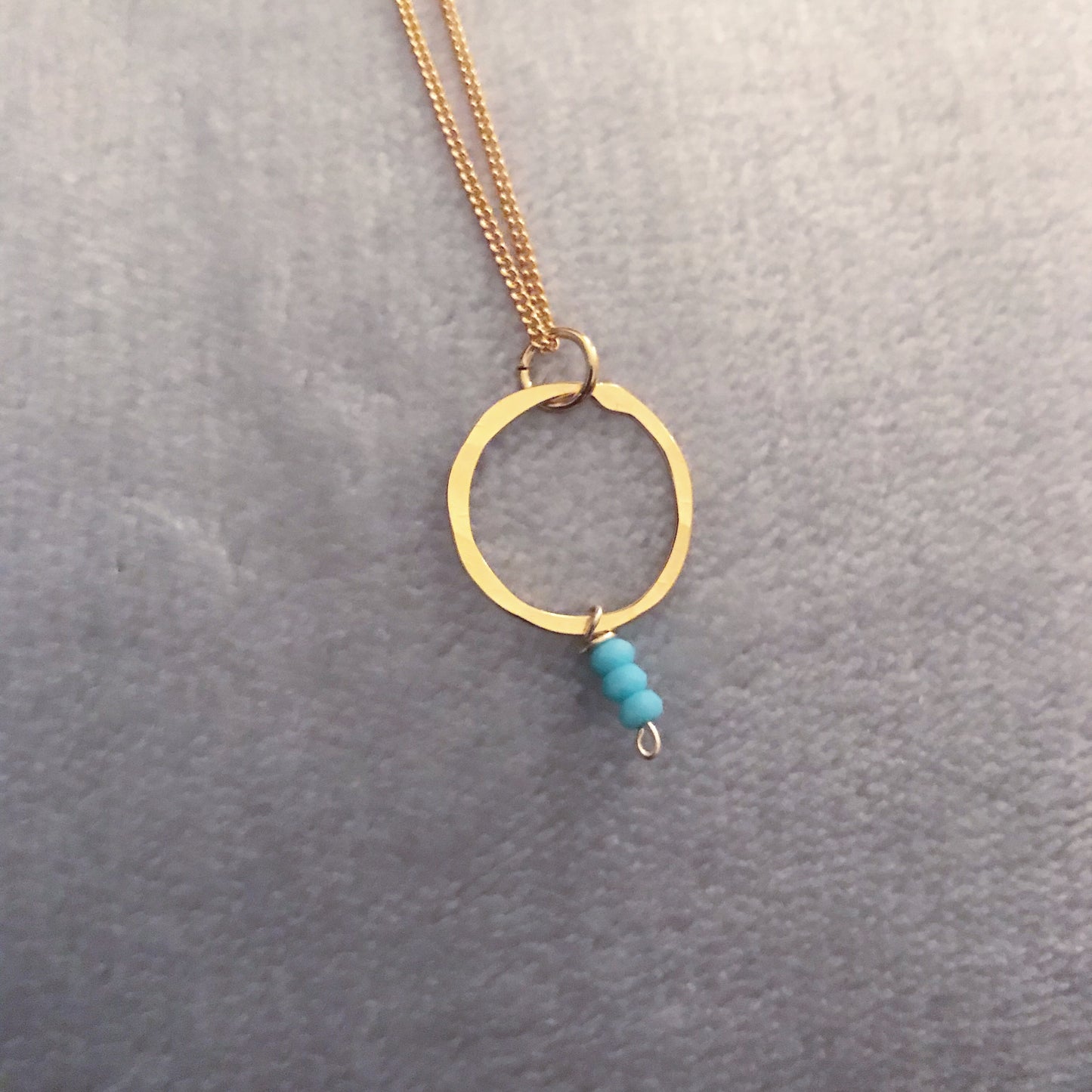 gold plated simple hoop and aqua quartz pendant