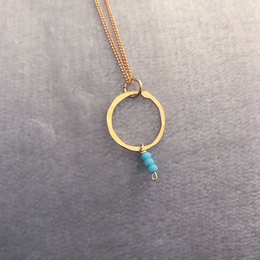 gold plated simple hoop and aqua quartz pendant