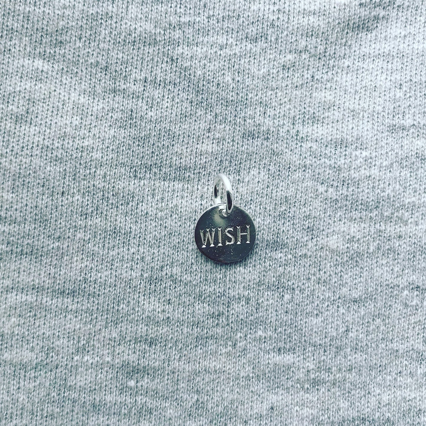 silver 'wish' disc charm