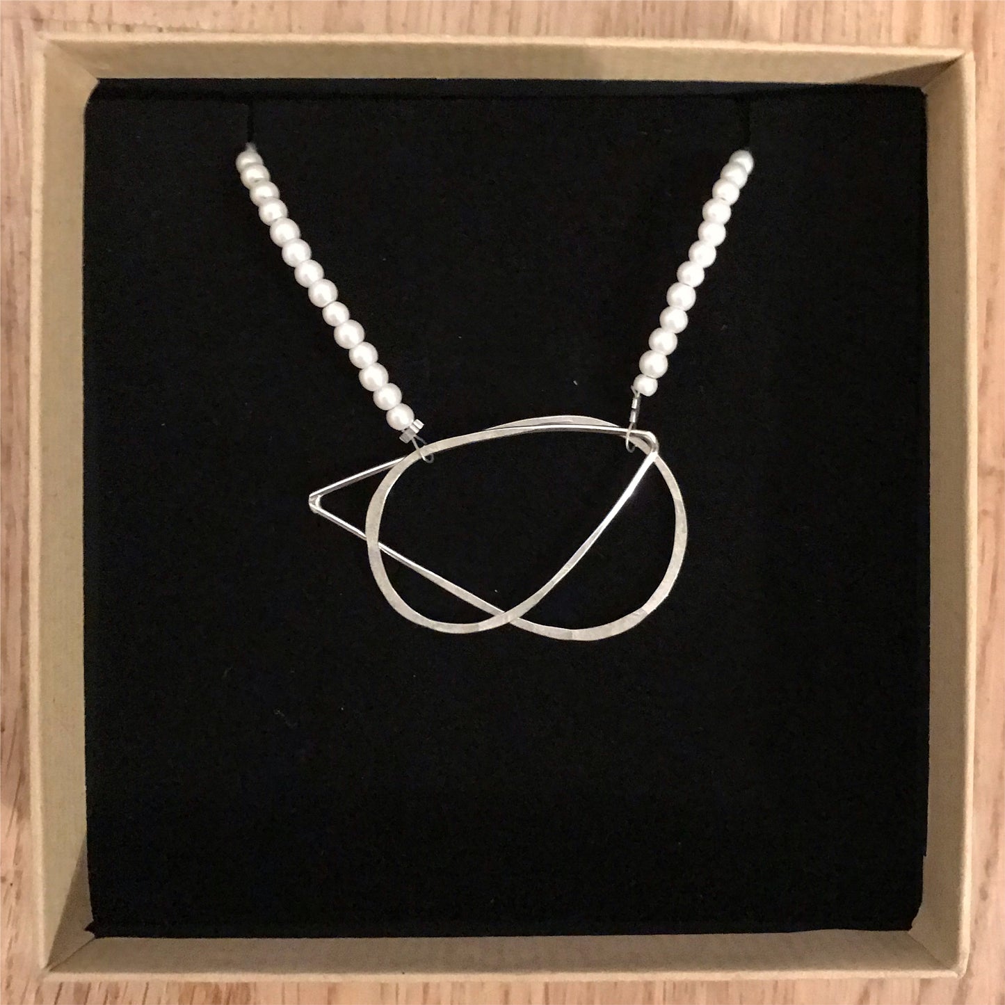 silver teardrop and pearl kinetic necklace