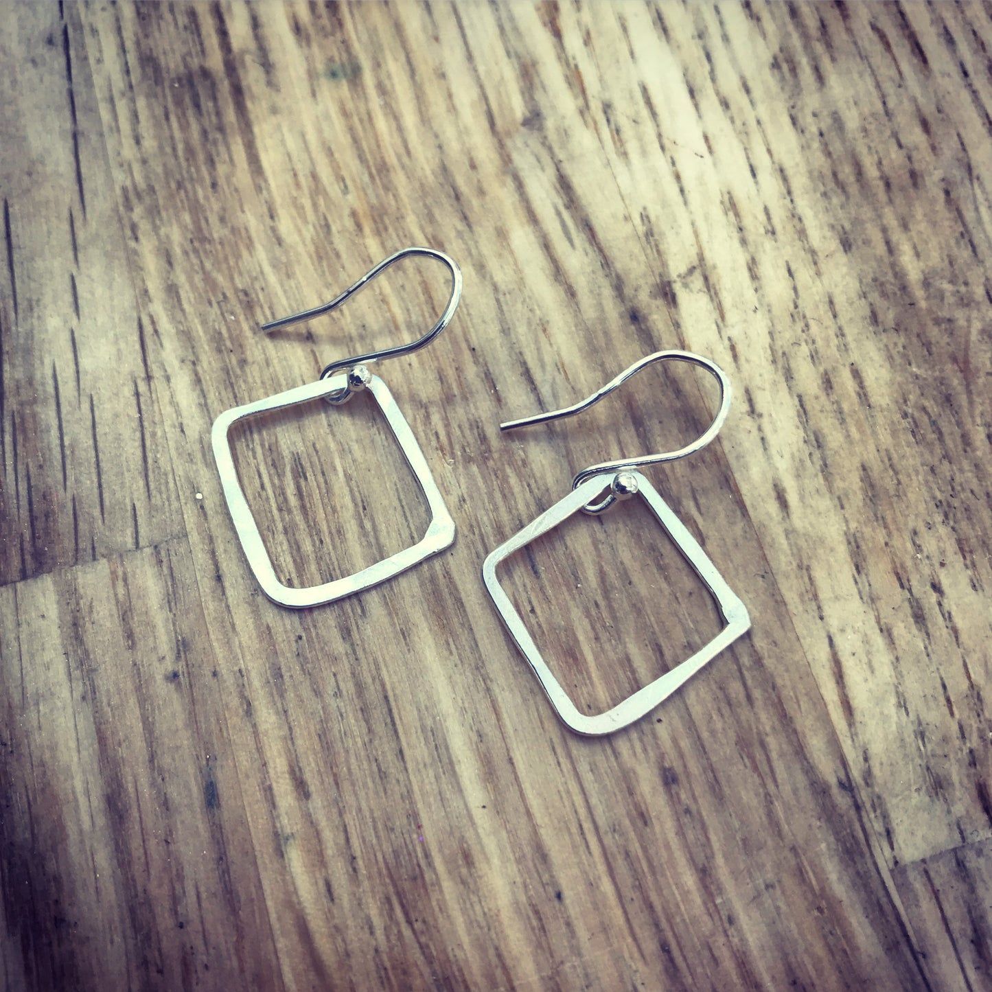 Hammered silver square outline drop earrings