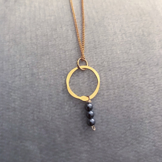 gold plated simple hoop and peacock pearl pendant