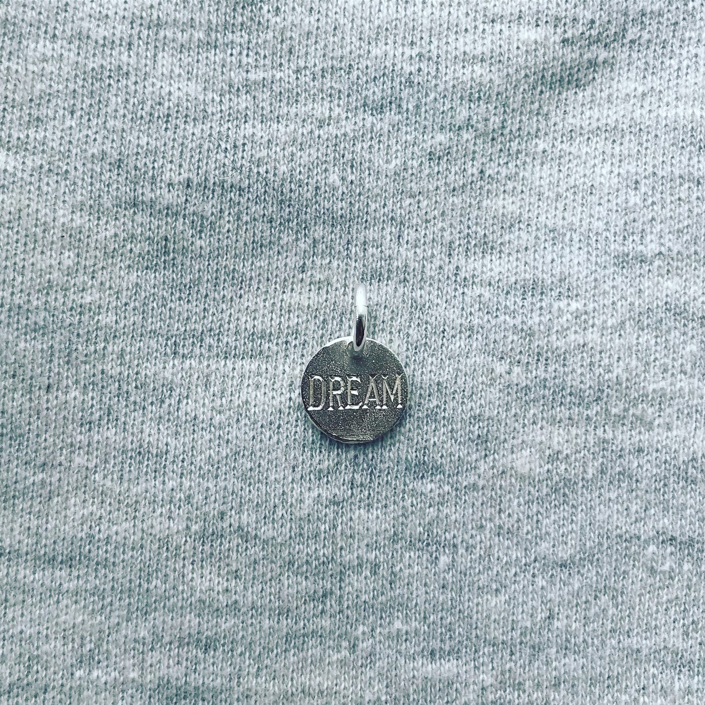 silver 'dream' disc charm