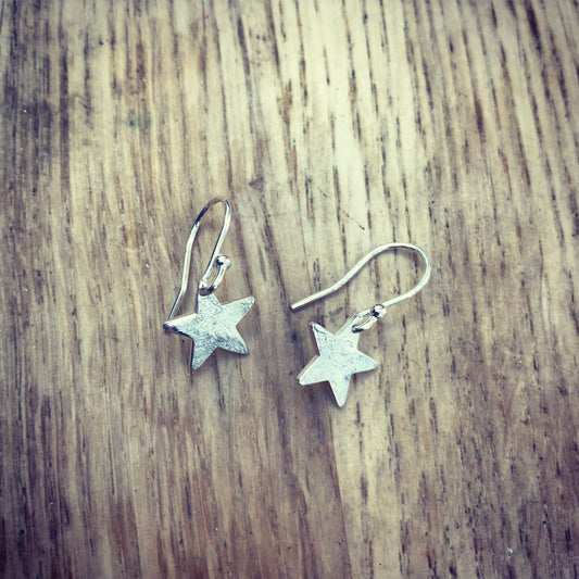 Hammered silver star drop earrings