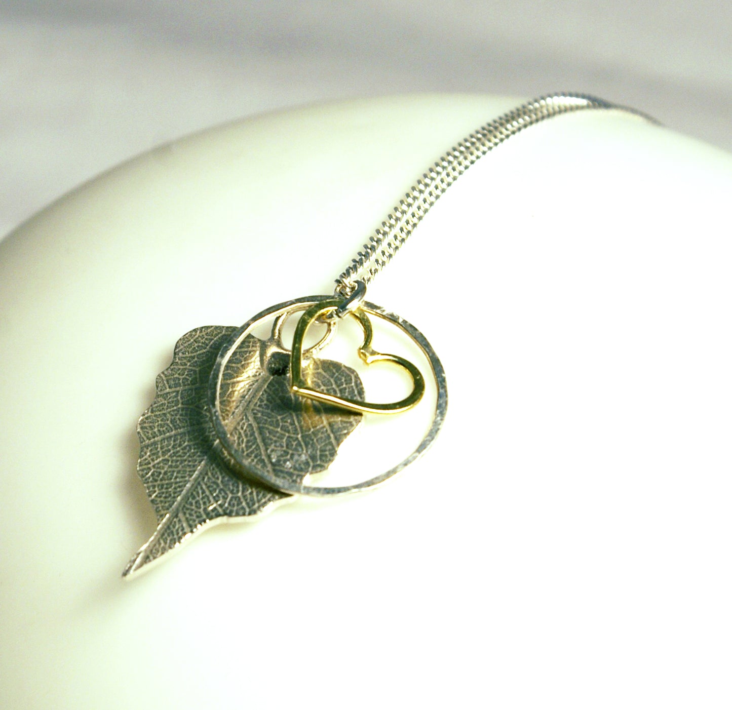 leaf, heart and hoop pendant