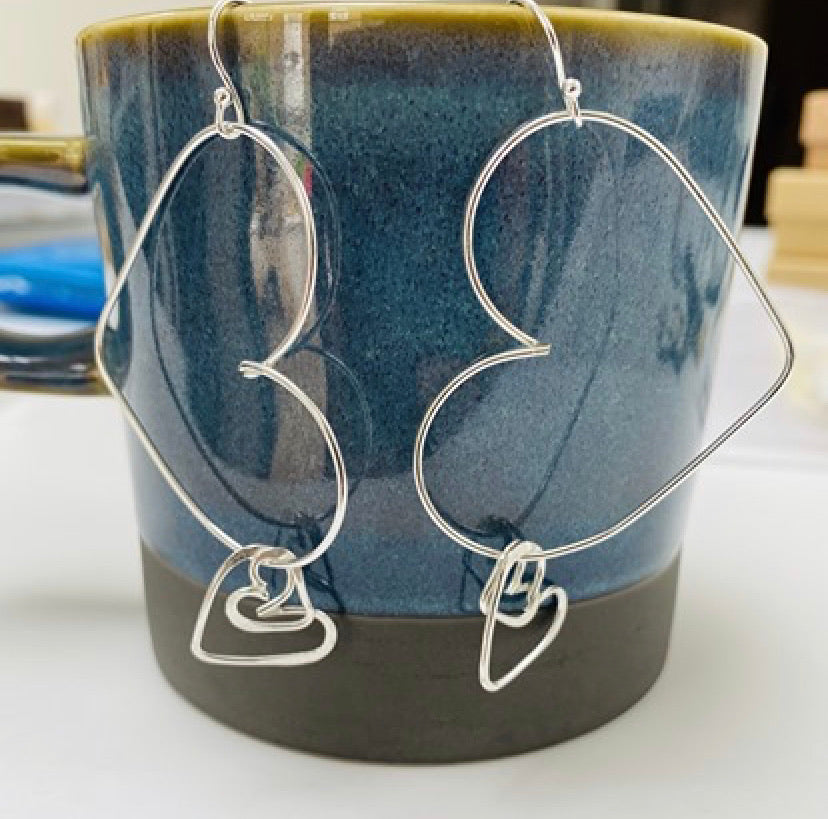 Large silver heart hoops with heart charms