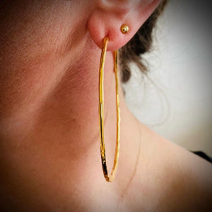 Large hammered gold plated silver hoop earrings