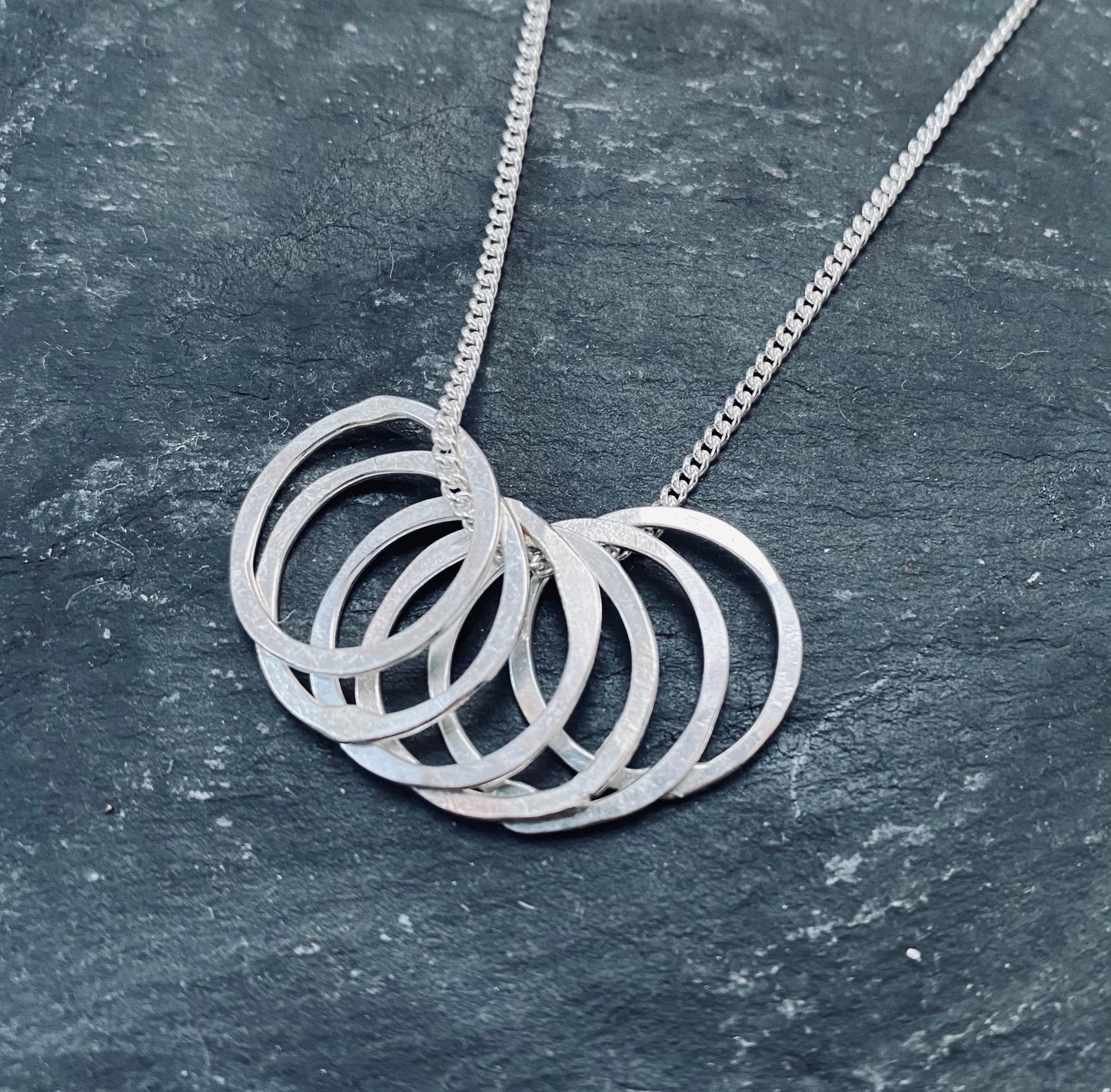 Silver multi hoop pendant